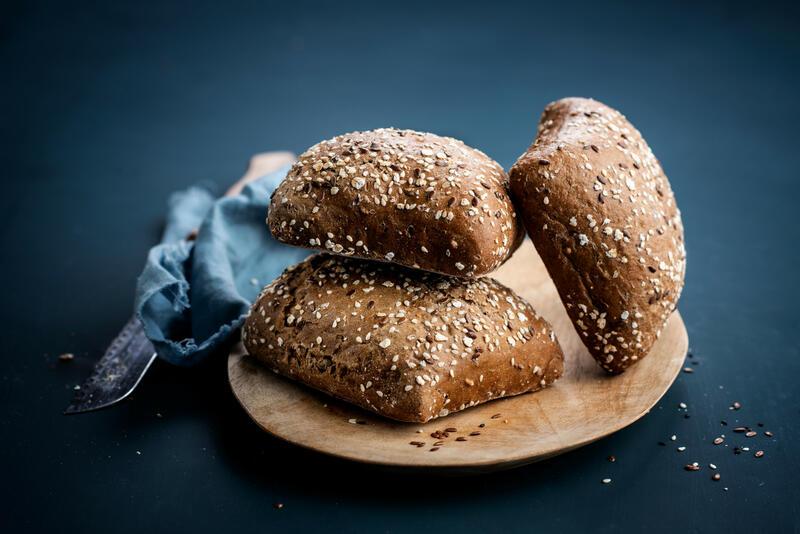 Small dark bread with seeds